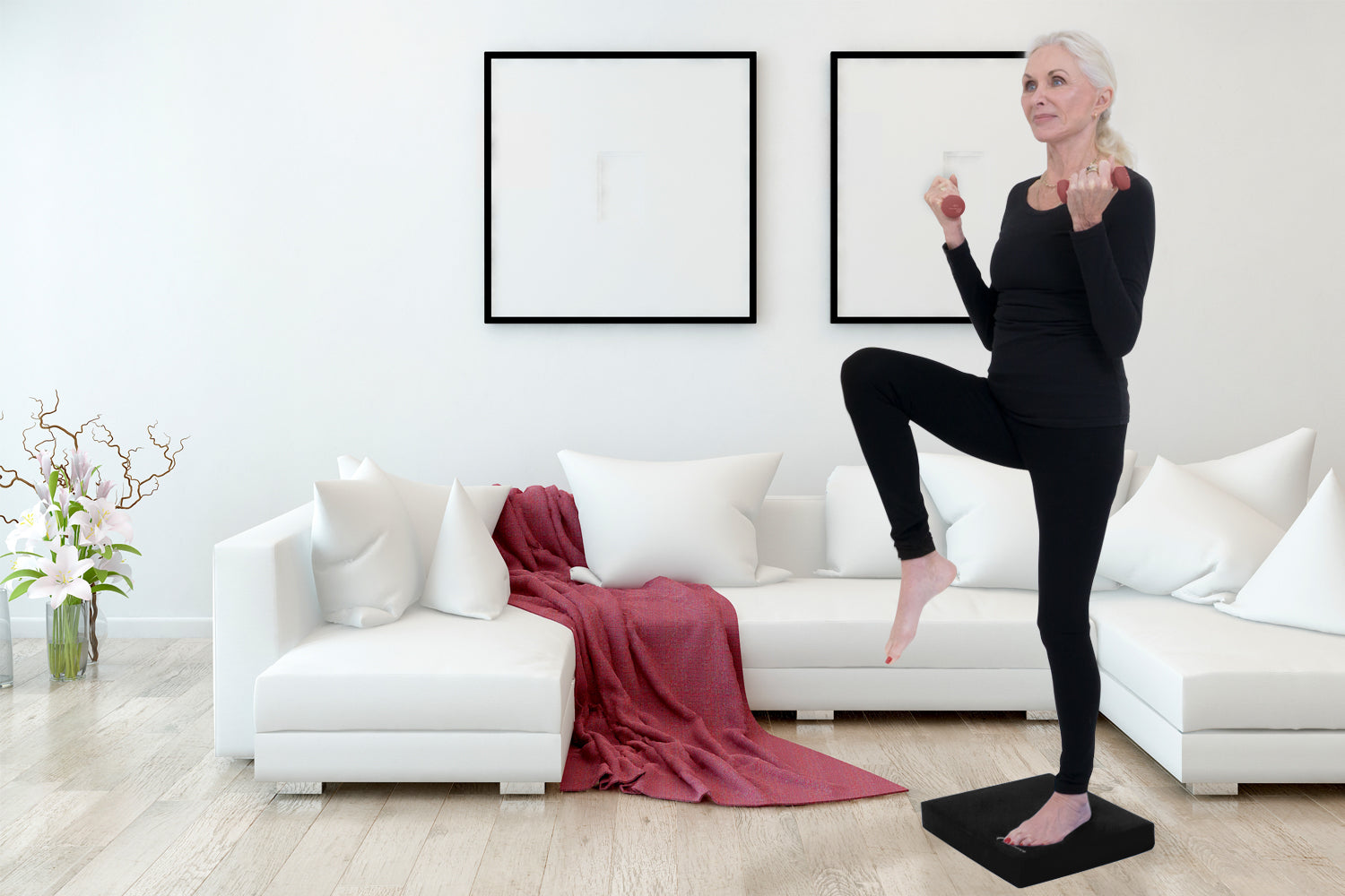 older woman balancing on one leg with prosourcefit exercise balance pad
